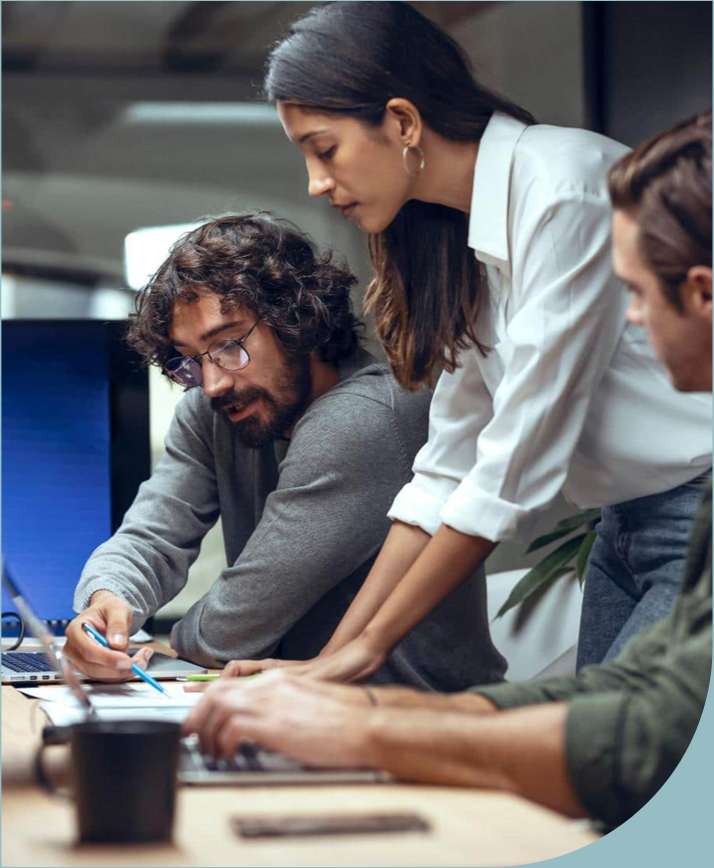 Colleagues working together on a business challenge